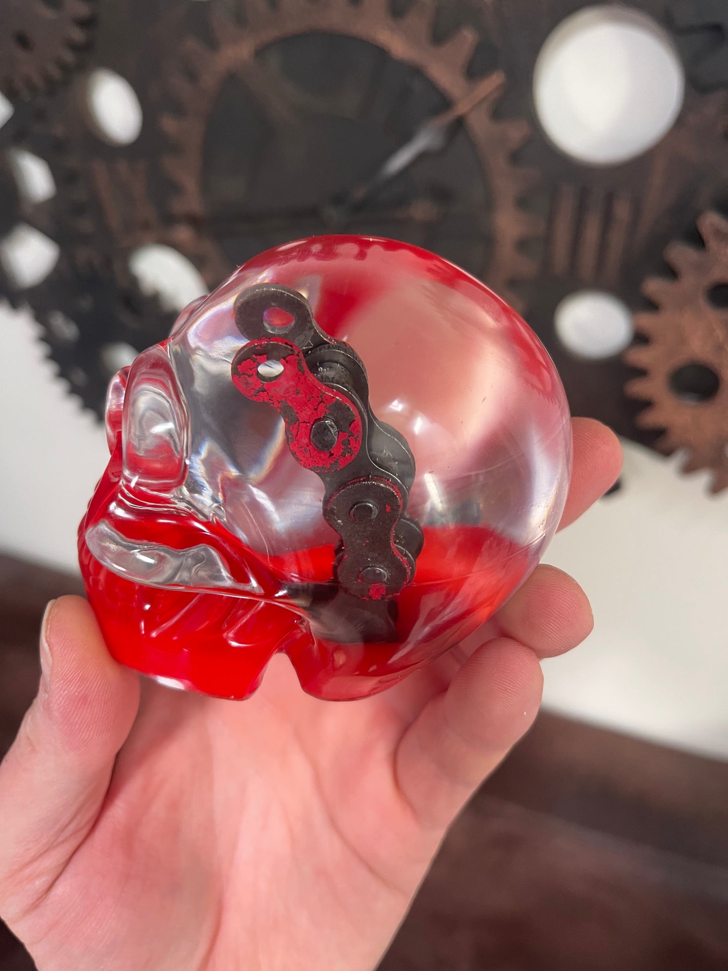 Large resin skull with motorcycle chain and resin